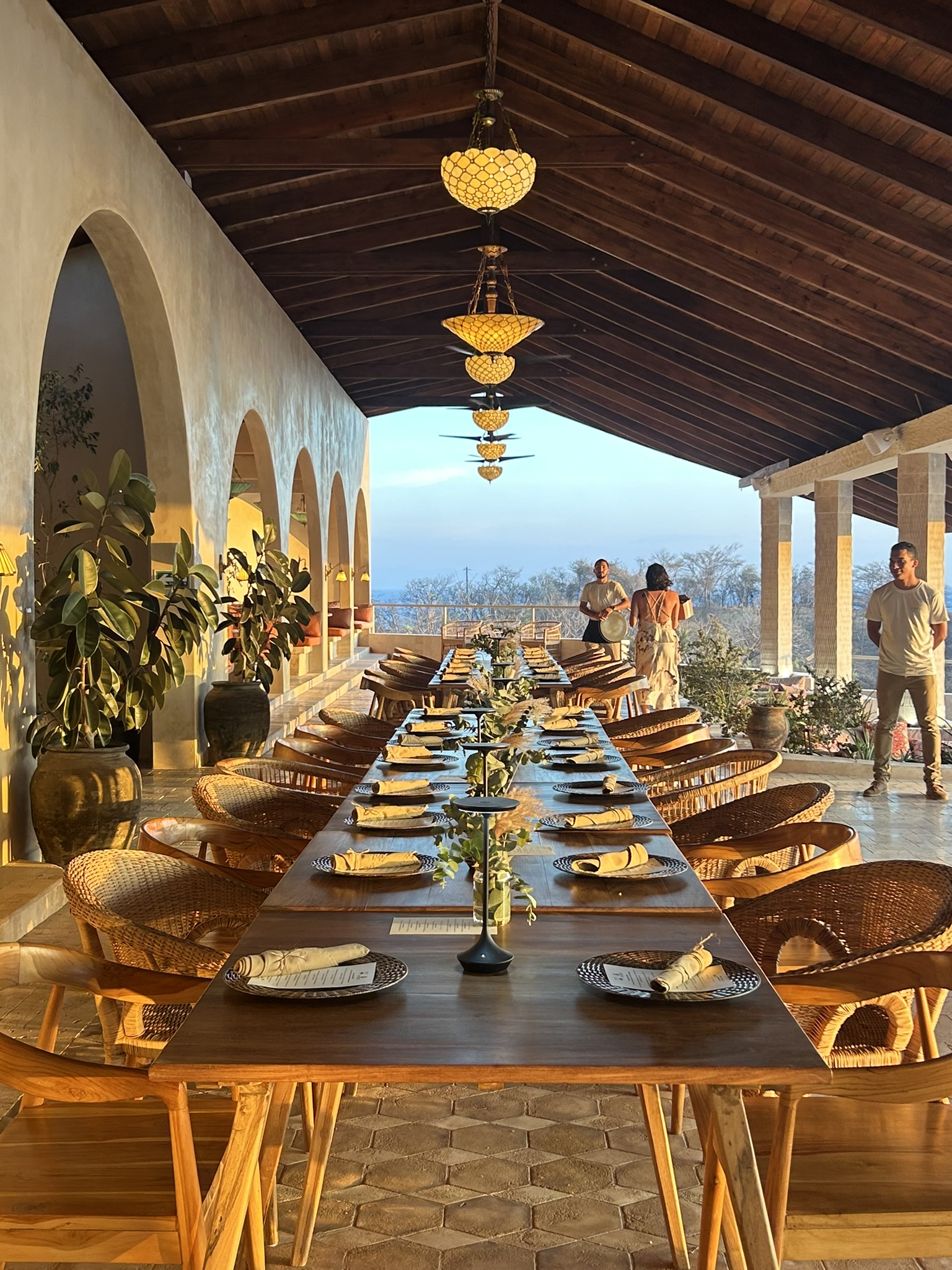 Dining under arches with lanterns